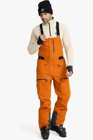 RevolutionRace Atlas 3L Ski Bib Pants Miehet Hawaiian Sunset, Koko:XS - > Talvihousut