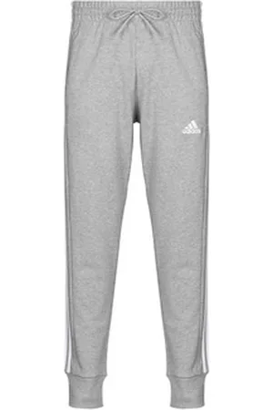 adidas Jogging housut / Ulkoiluvaattee Essentials French Terry Tapered Cuff 3-Stripes Joggers EU S